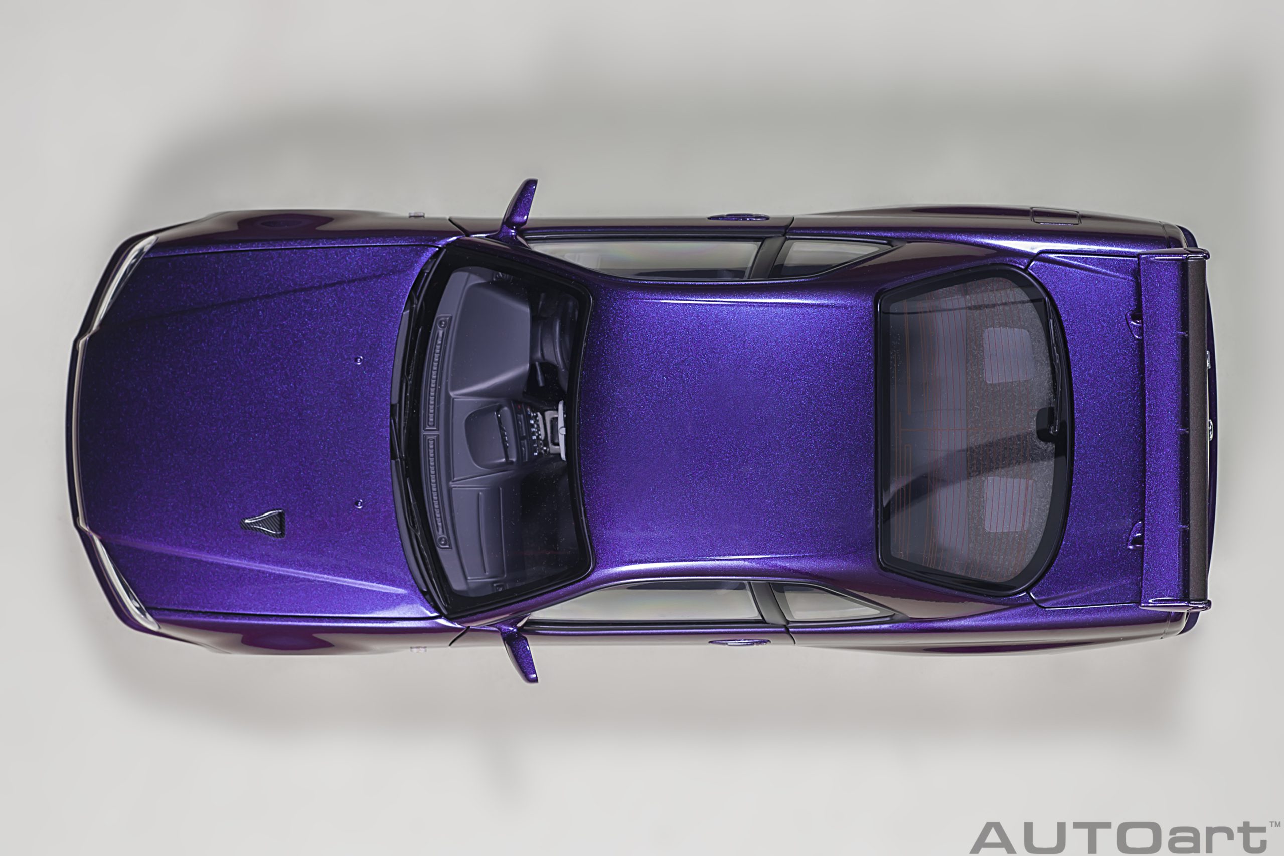 Nissan Skyline GT-R (R34) V-Spec II with BBS LM wheels (Midnight Purple III) - immagine 8